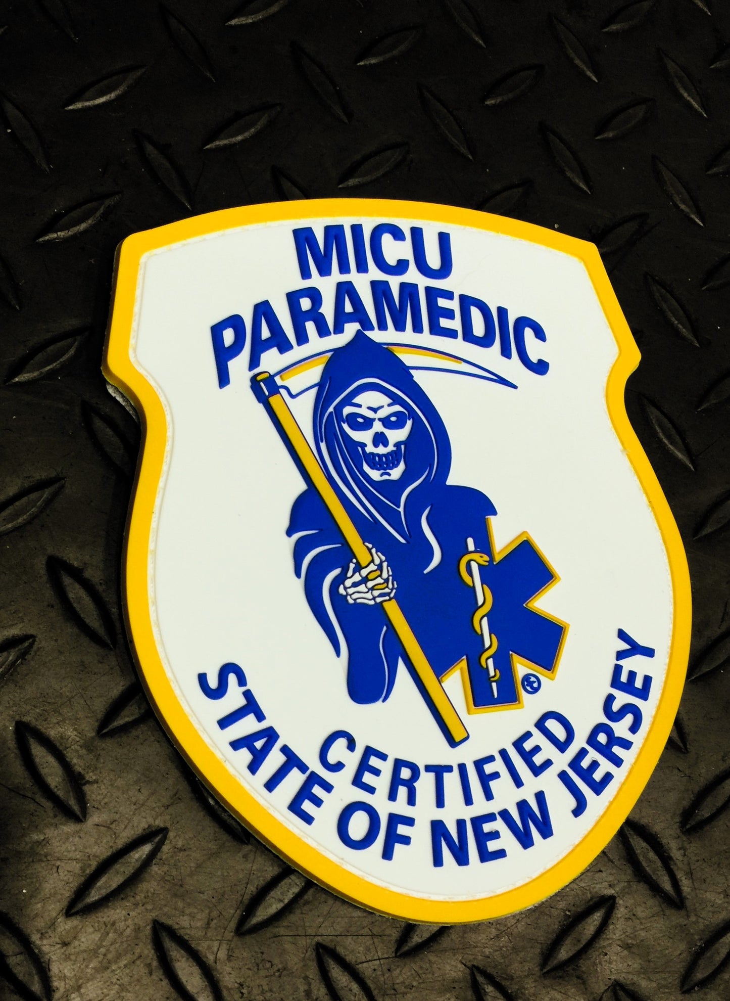 Skell City New Jersey MICU Paramedic PVC Velcro Patch up against steel gray gridiron background